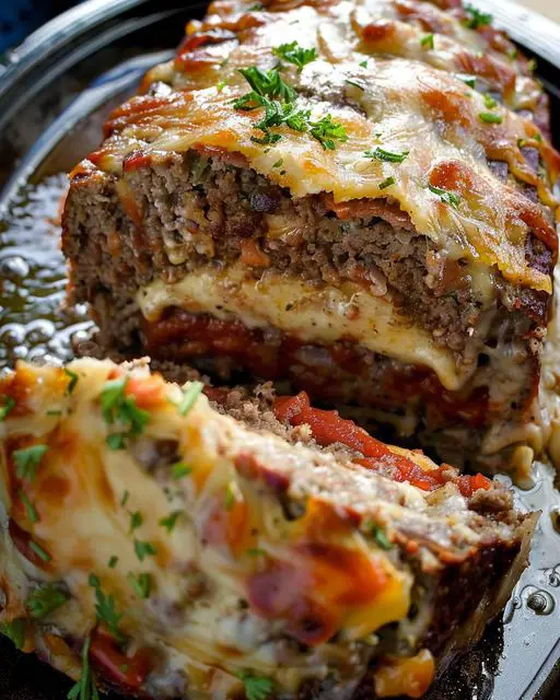 “Discover the Fusion of Flavors with Our Philly Cheesesteak Meatloaf Recipe!