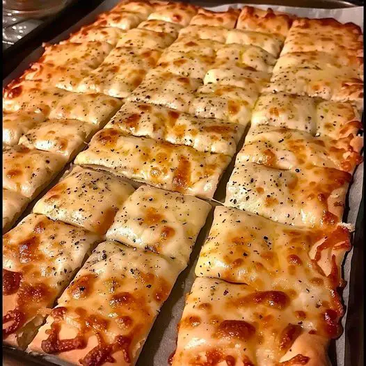 HOMEMADE CHEESY GARLIC BREADSTICKS