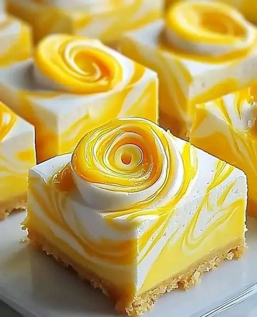 Elegant Lemon Marbled Cheesecake Bars