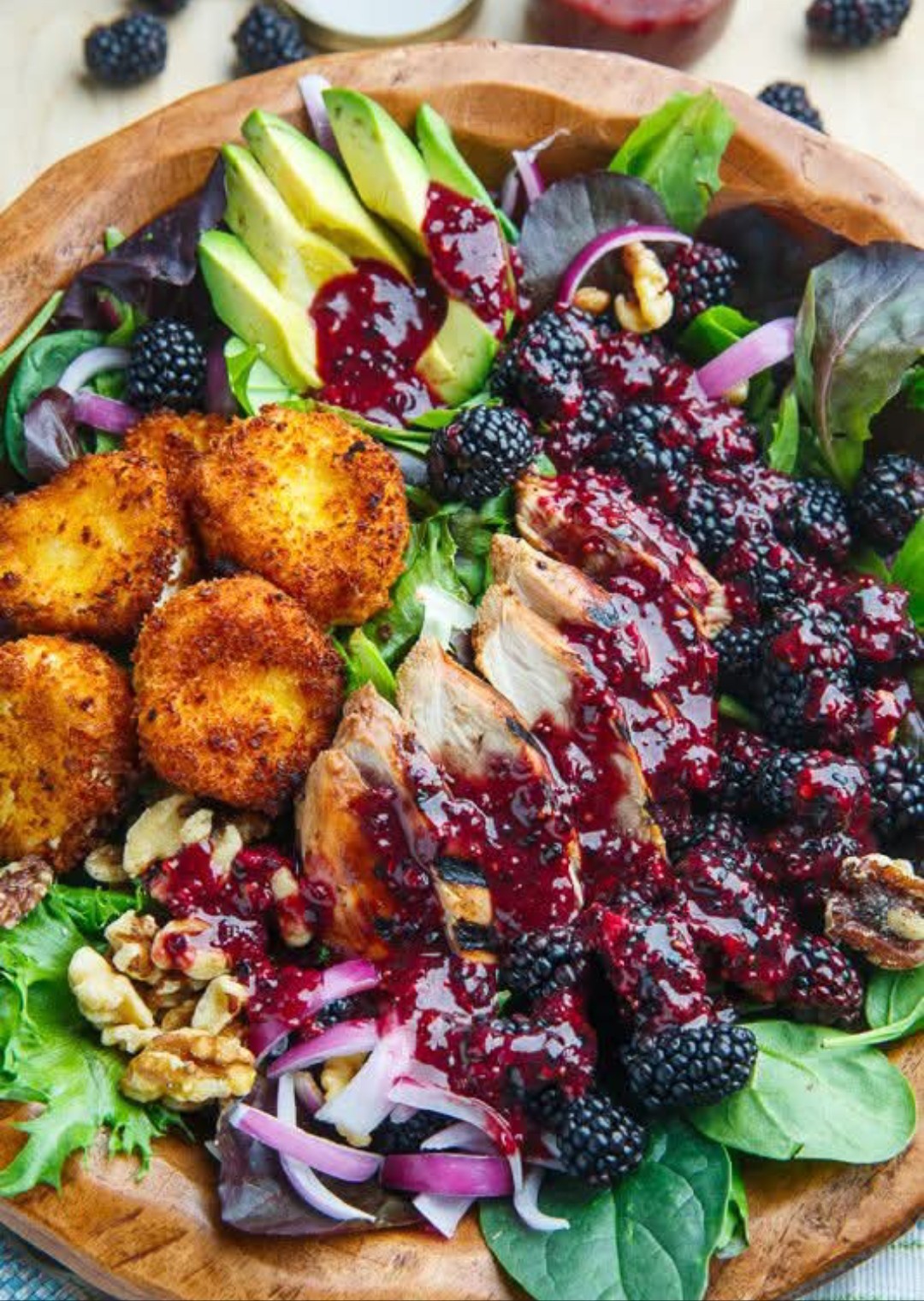 Blackberry balsamic grilled chicken salad with crispy fried goat cheese