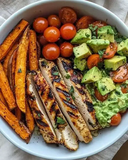 Grilled Chicken Power Bowl  with Sweet Potato Fries & Fresh Avocado Salsa